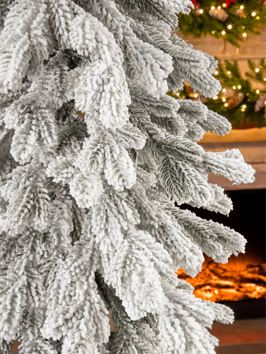 Christmas trees on wooden trunks artificial snow-covered molded with LED (set of 3)